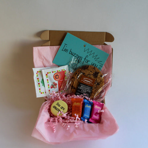 The Tea and Biscuits Box with pink tissue, West Cork Biscuit Co. Giant chocolate chip cookie, Cookie creations by lu custom 'you are amazing' cookie butlers mini chocolates and niks tea in peppermint and berry